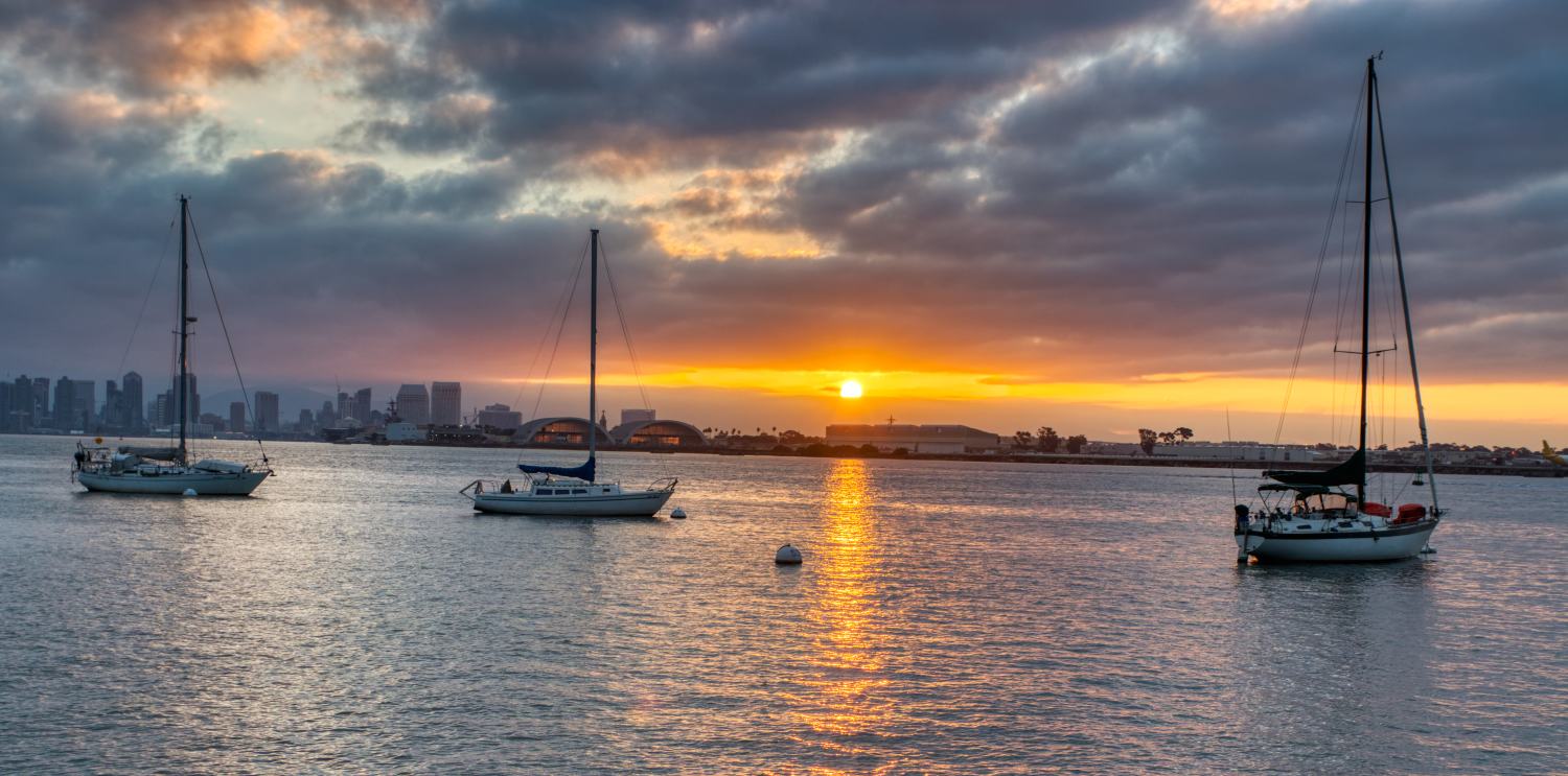 Sunrise with 3 sailboats in the San Diego Bay