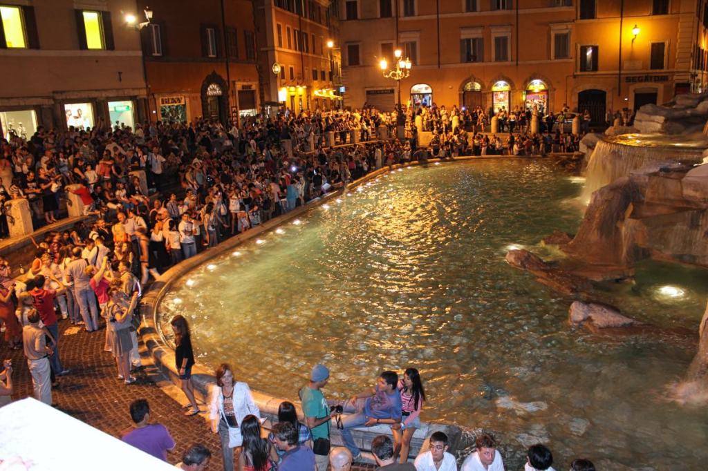 Evening Crowd at Trevi Fountain in Rome, Italy