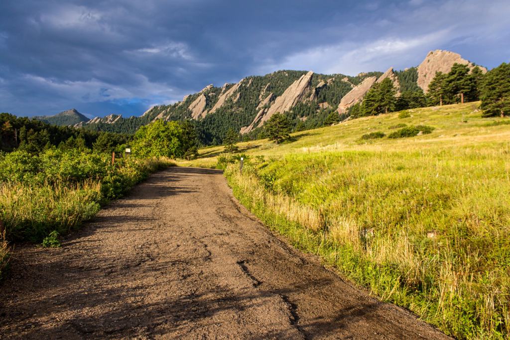 Empty hiking trail soaked in early morning sun